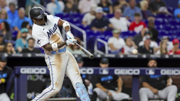 Sep 24, 2023; Miami, Florida, USA; Miami Marlins designated hitter Jorge Soler (12) hits a single against the Milwaukee Brewers during the eighth inning at loanDepot Park. Mandatory Credit: Sam Navarro-USA TODAY Sports  